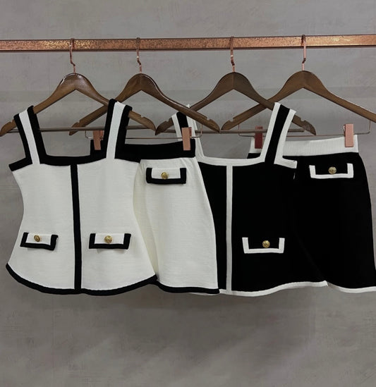 Black and white peplum skirt and blouse set with buttons