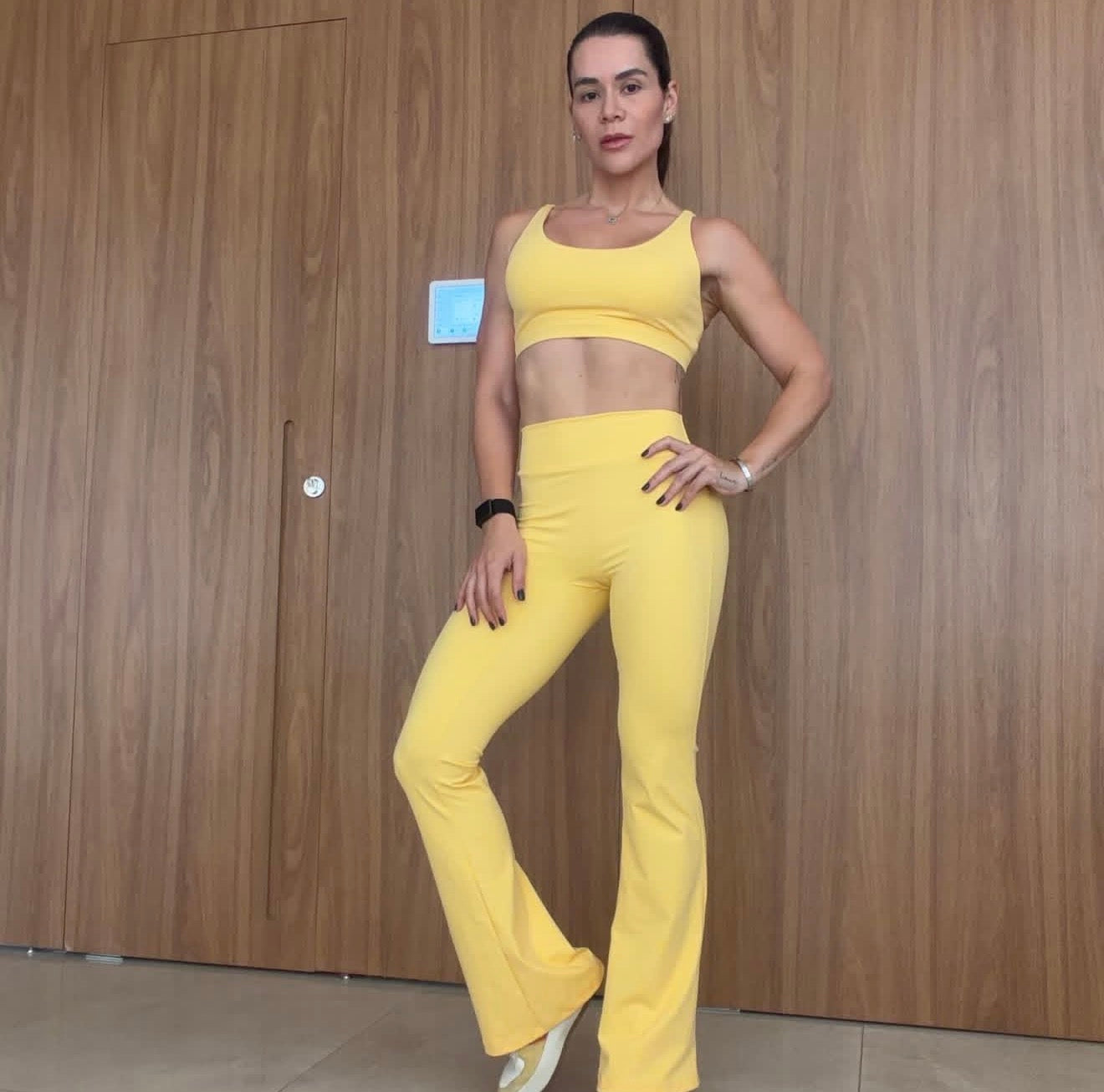 Yellow flare leggings with shaping effect